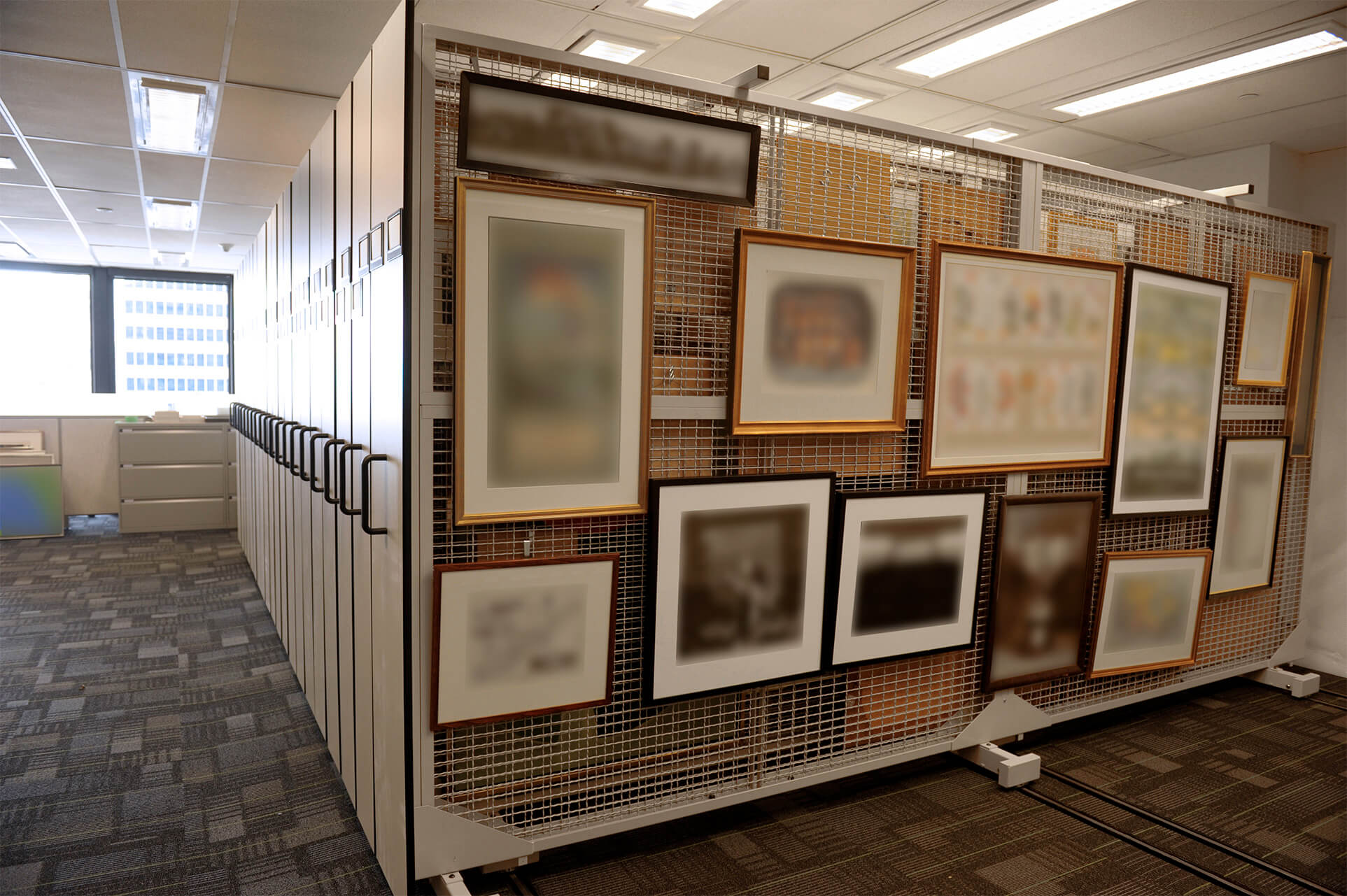 Fine art storage on compact mobile art racks at Ontario Bank