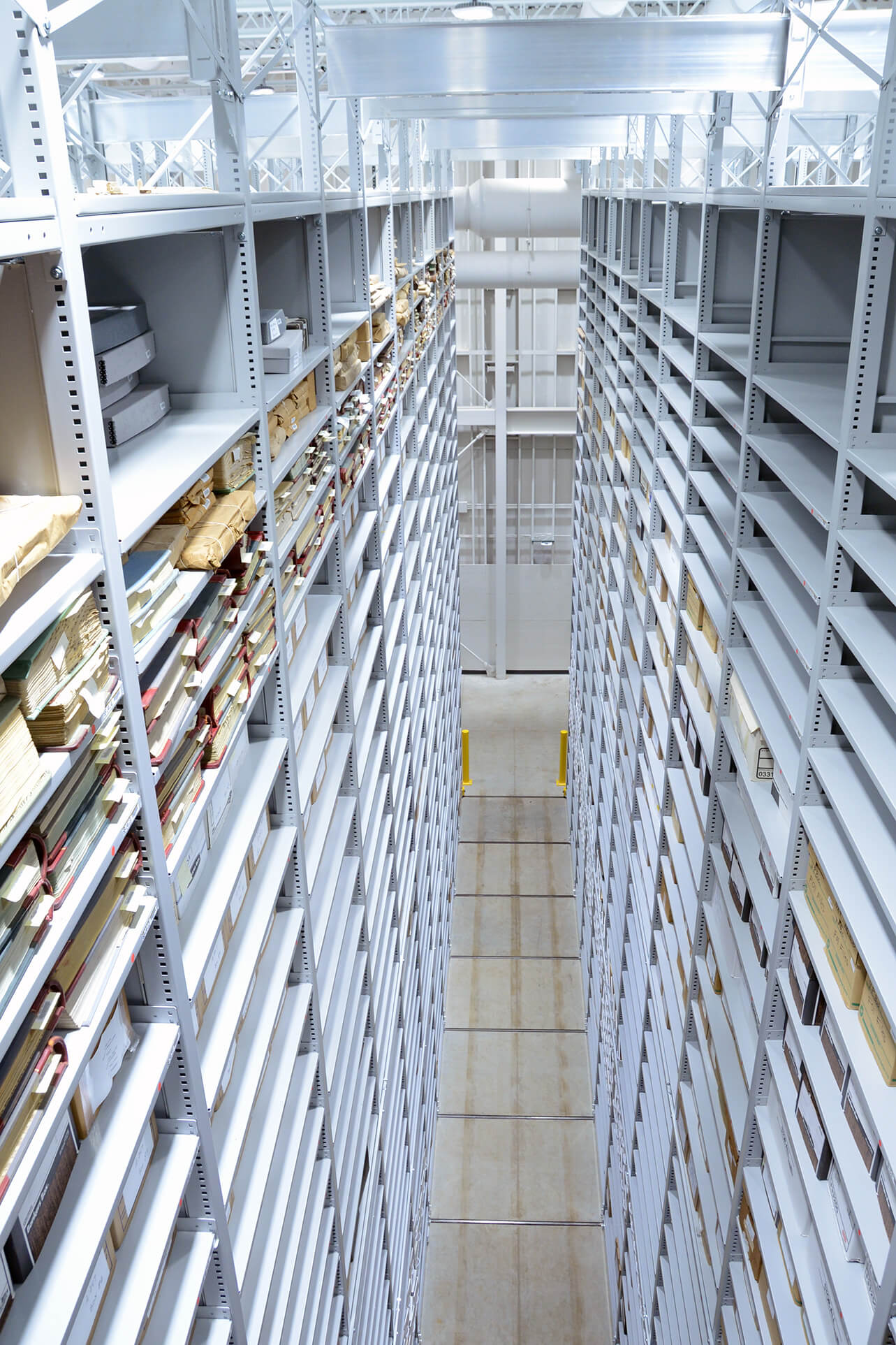 Archival Library Shelving on 34 foot tall compact mobile storage system