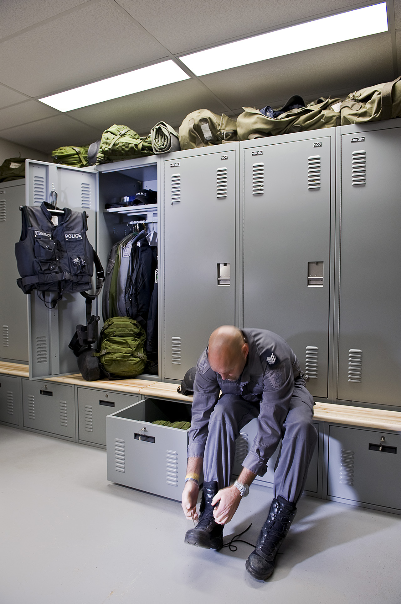 Personal storage lockers with benches at Peterborough Police Department