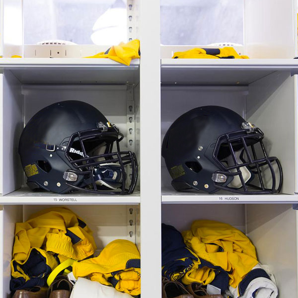 helmet athletic equipment storage in bins at university