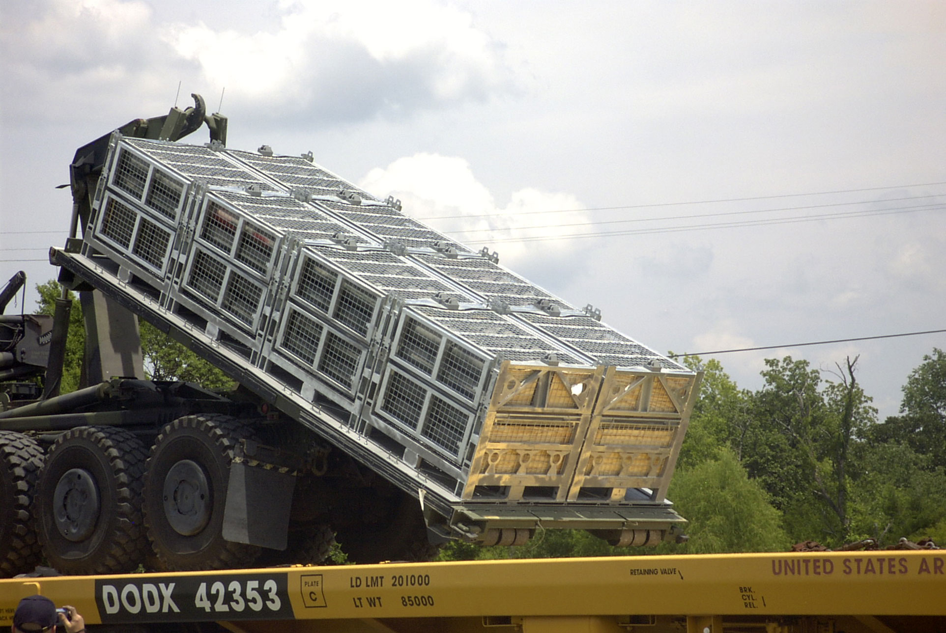 Set of Deployable Military Containers Being Transported