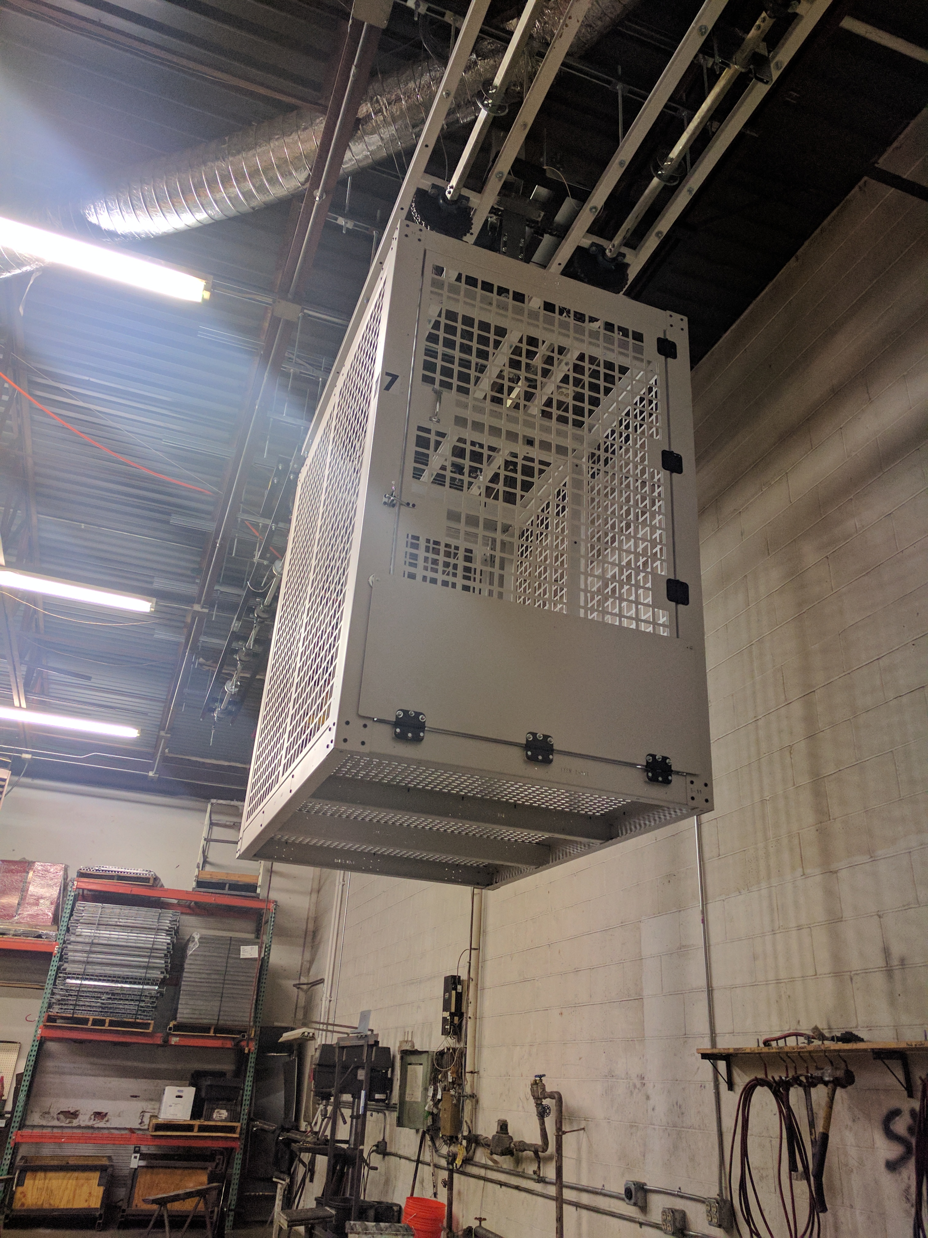 Secure Overhead Rolling Security cage