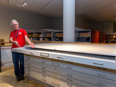 The Mariner's Museum archivist displaying the new Spacesaver Museum Flat file