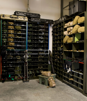 Universal weapons racks and racking for optics in armory